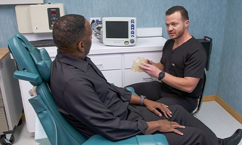 dental implants oral surgeon and patient